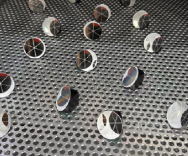 Plasma treated optical glass prisms
