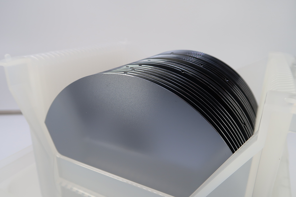 Silicon wafers stacked in carrier cassette for semiconductor fabrication and advanced microelectronics manufacturing